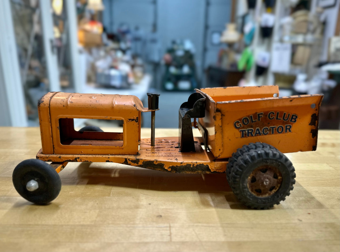 Side view of vintage Tonka Golf Club Tractor from the 1960s