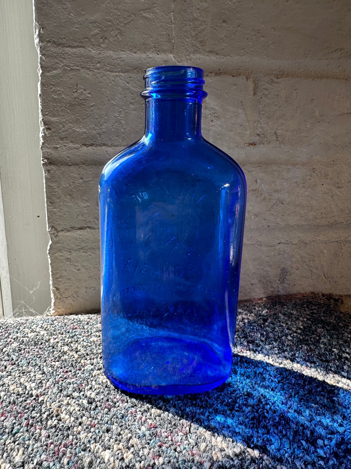 vintage cobalt blue milk of magnesia bottles