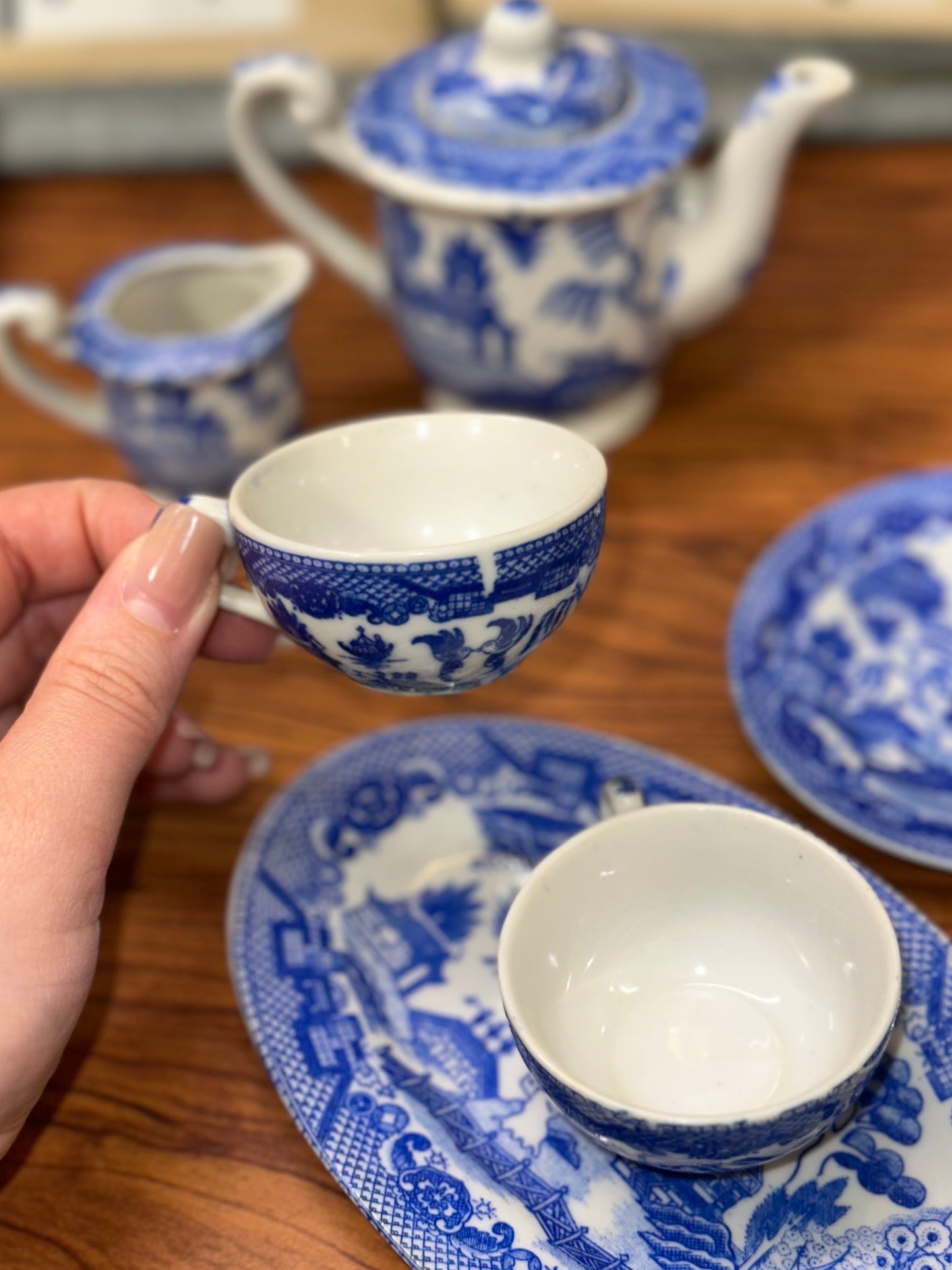 Miniature Blue Willow tea cups close up