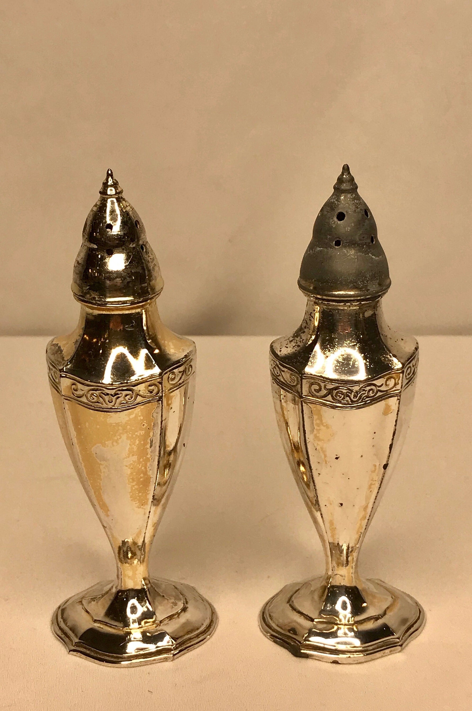 Silver plated salt and pepper outlet shakers