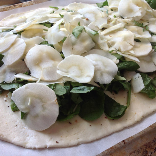 Unveiling the Delicious: Spinach, Parsnips, Pine Nuts, and Cheese Pizza - A Flavorful Blend of Earthy Tastes