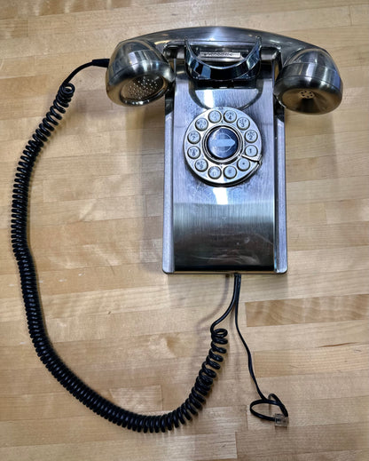 Crosley CR55 vintage-style chrome wall phone front view