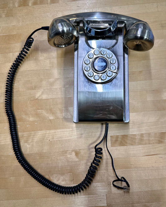 Crosley CR55 vintage-style chrome wall phone front view