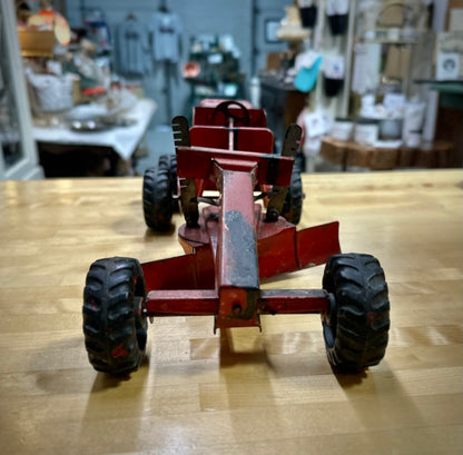 Vintage 1950s Nylint pressed steel road grader toy front view