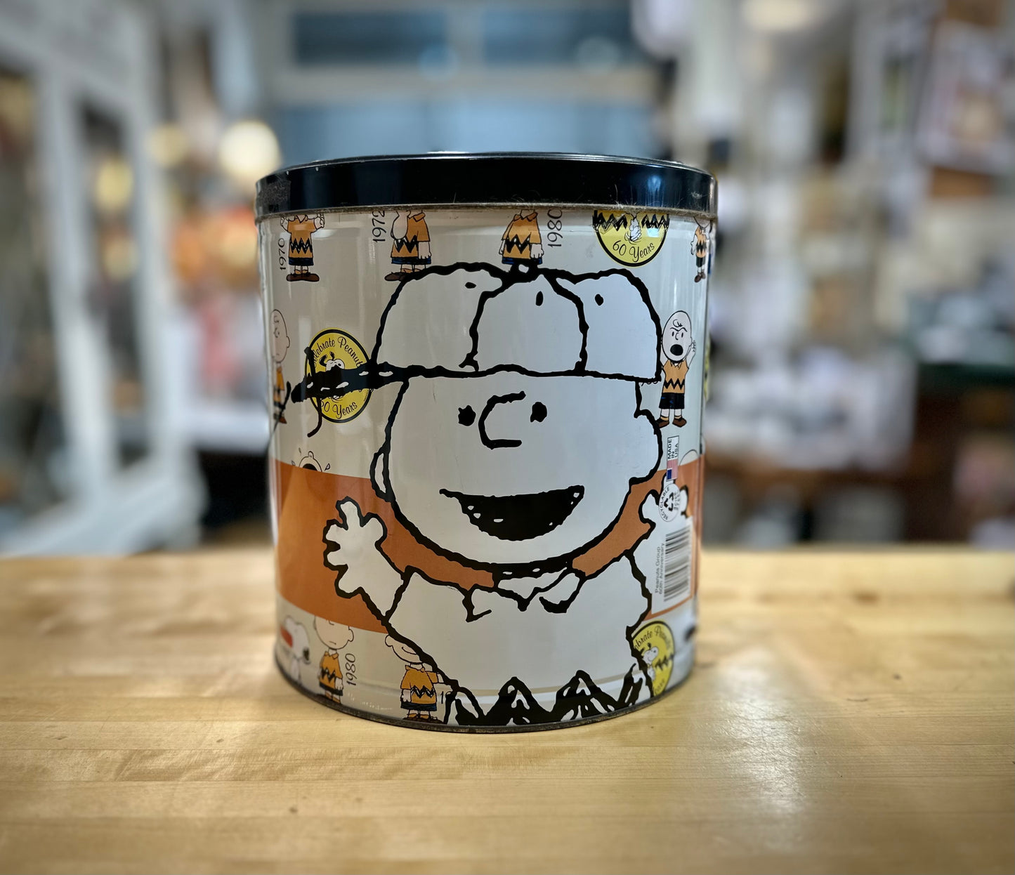 Side view of 2009 60th Anniversary Peanuts Popcorn Tin showing Charlie Brown Artwork