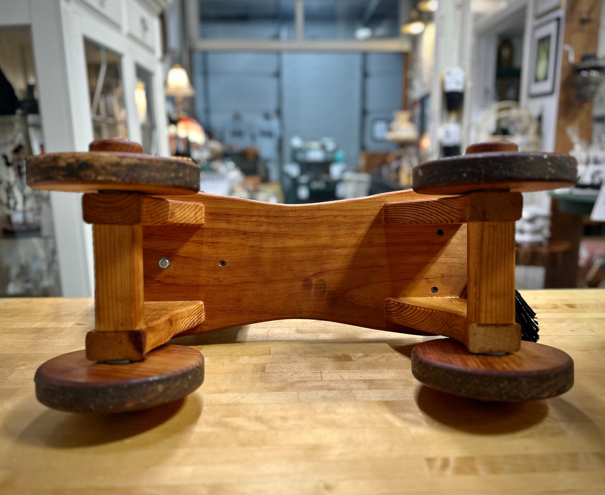 Locally crafted wooden ride-on horse underside