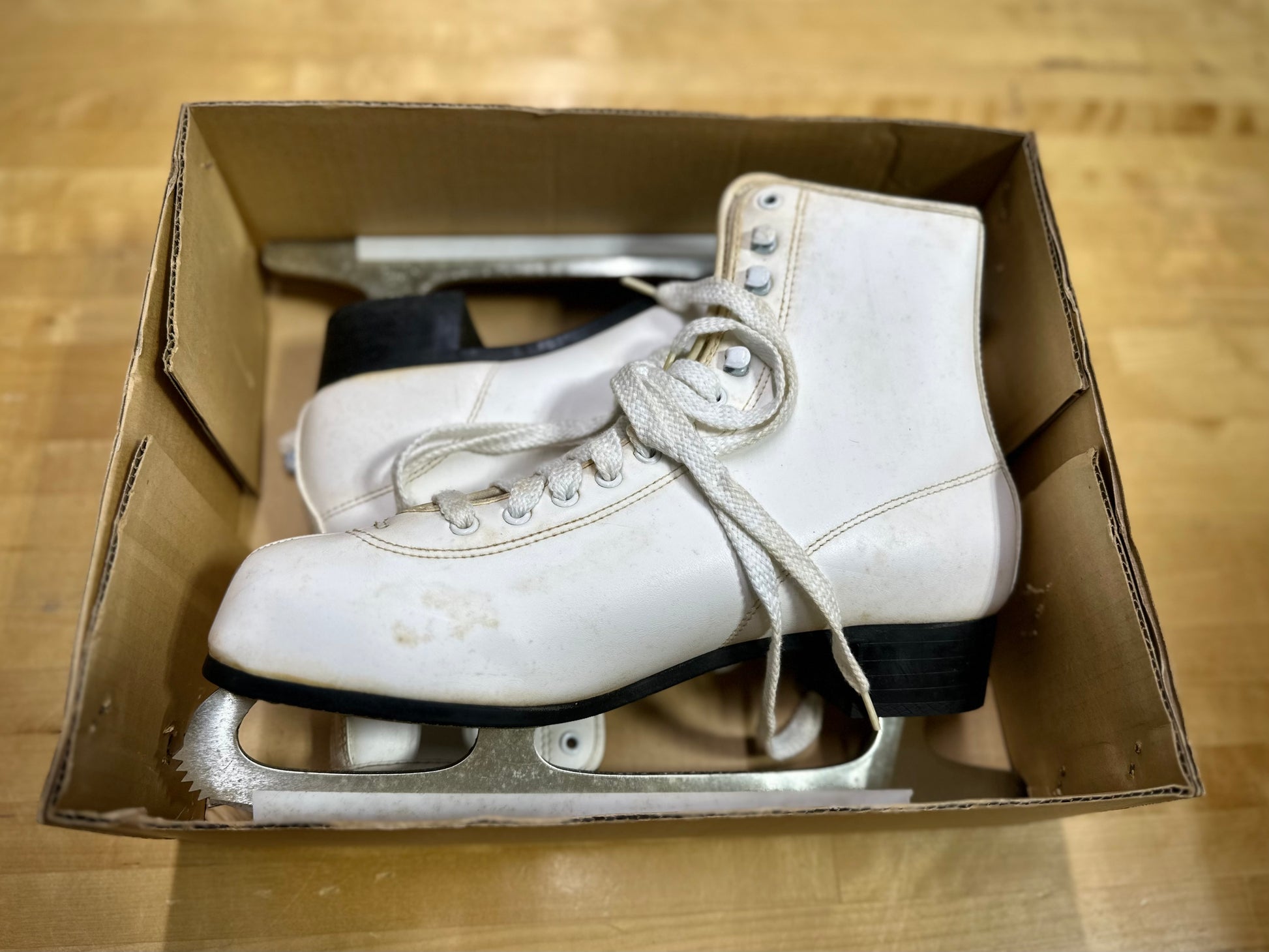 White Vintage insulated figure skates close-up