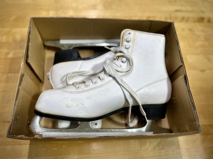 White Vintage insulated figure skates close-up
