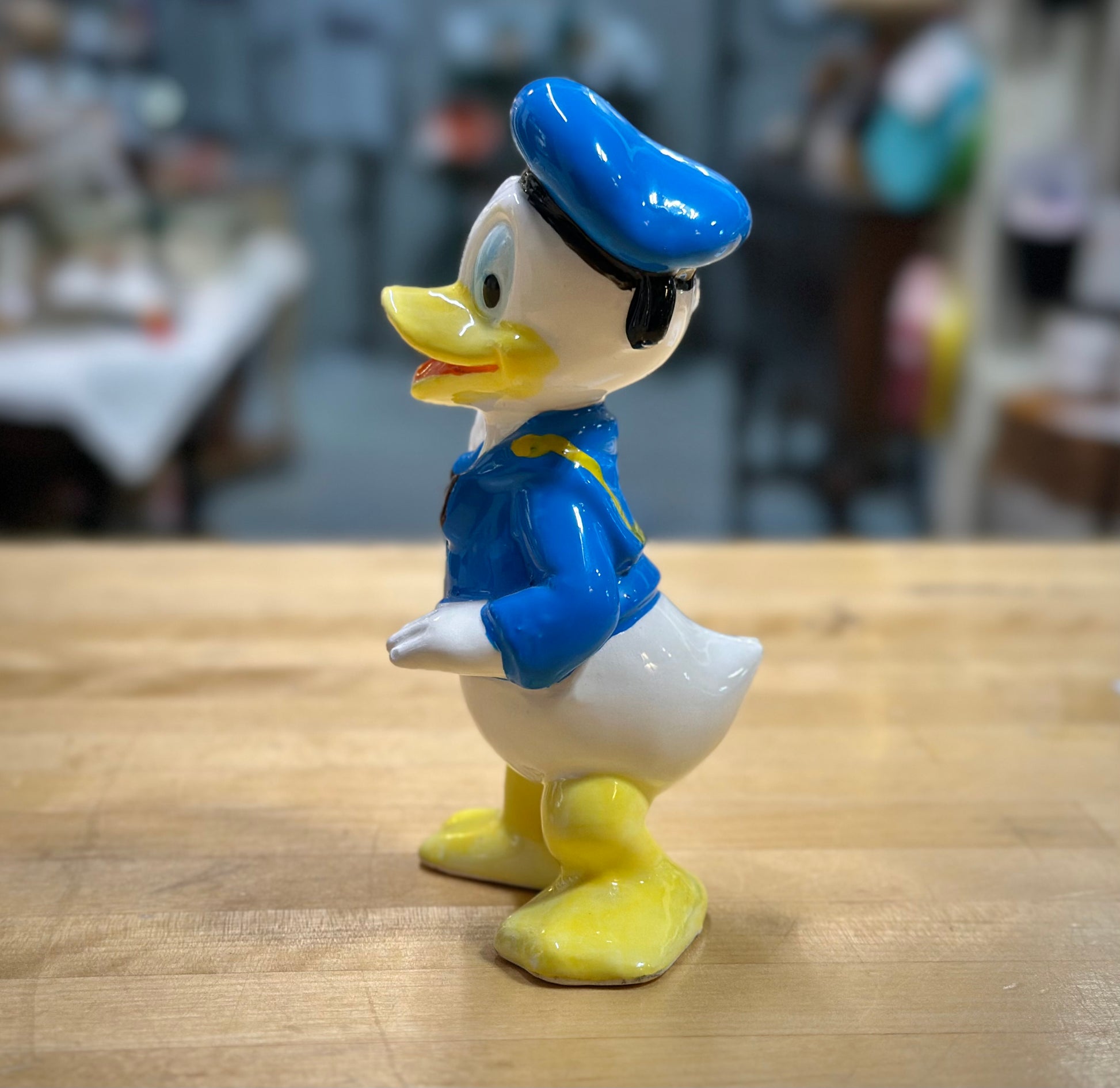 Side facing ceramic Donald Duck figurine