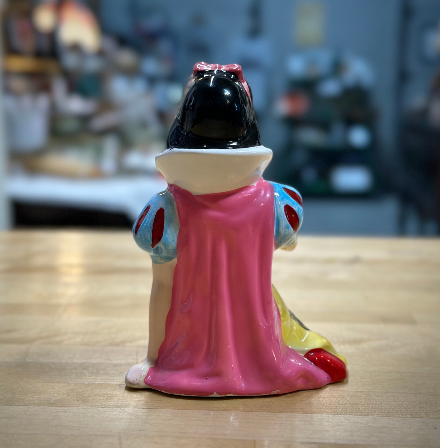 Back view of ceramic Snow White figurine