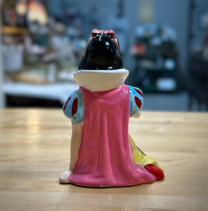 Back view of ceramic Snow White figurine
