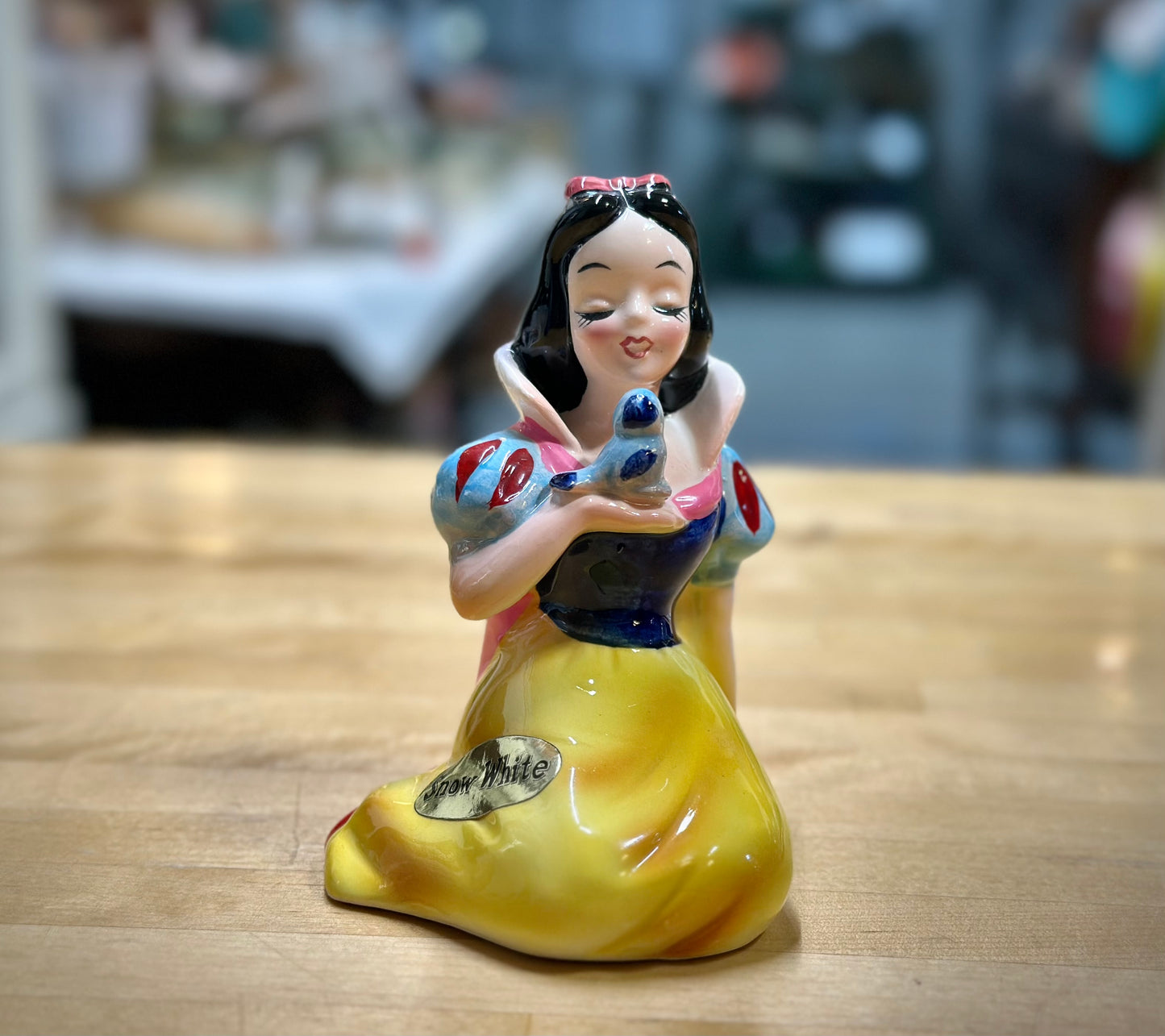 Front facing ceramic Snow White figurine