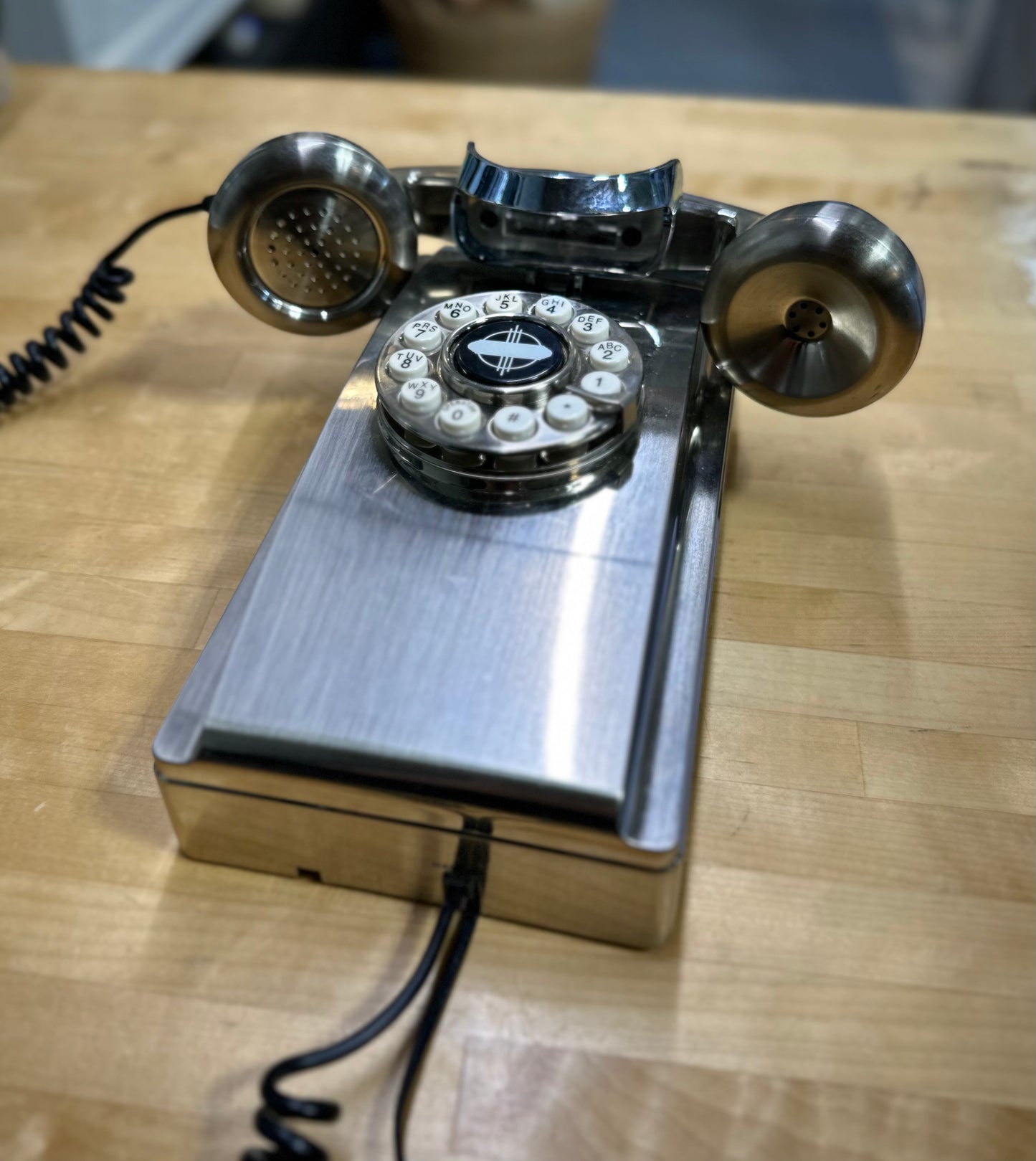 Retro chrome wall-mounted phone side angle