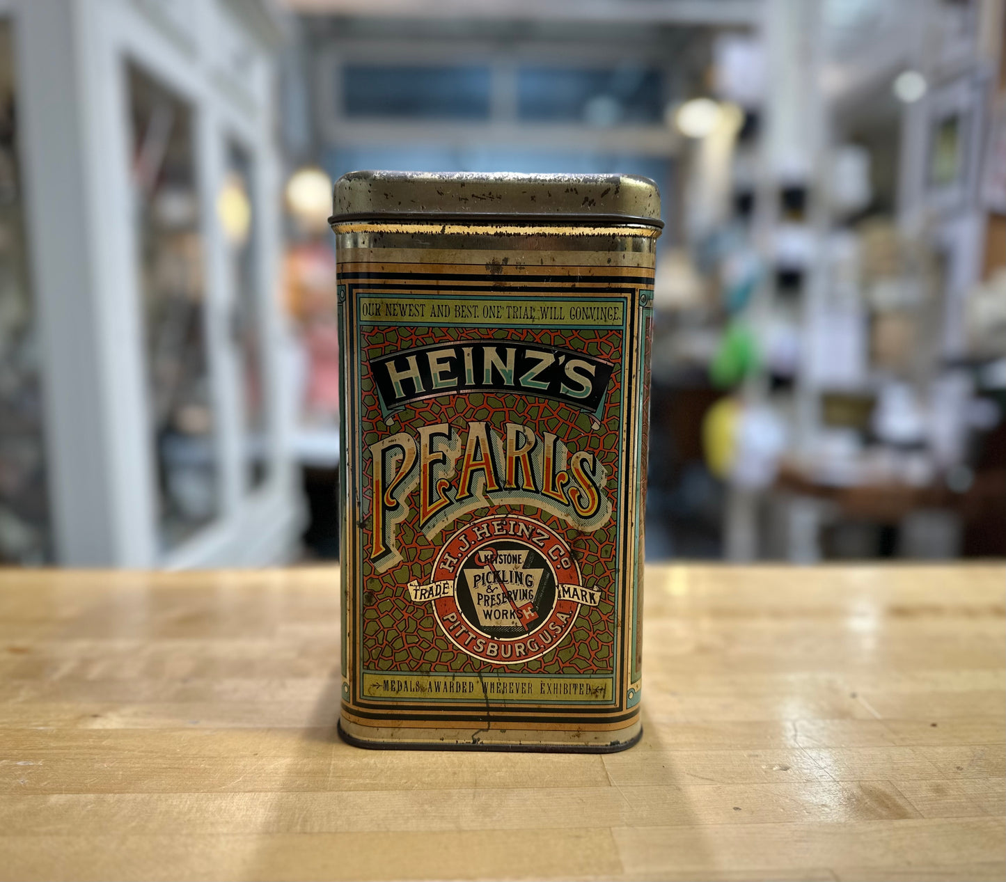 Side view of 1960’s vintage Heinz Pearls tin with classic branding