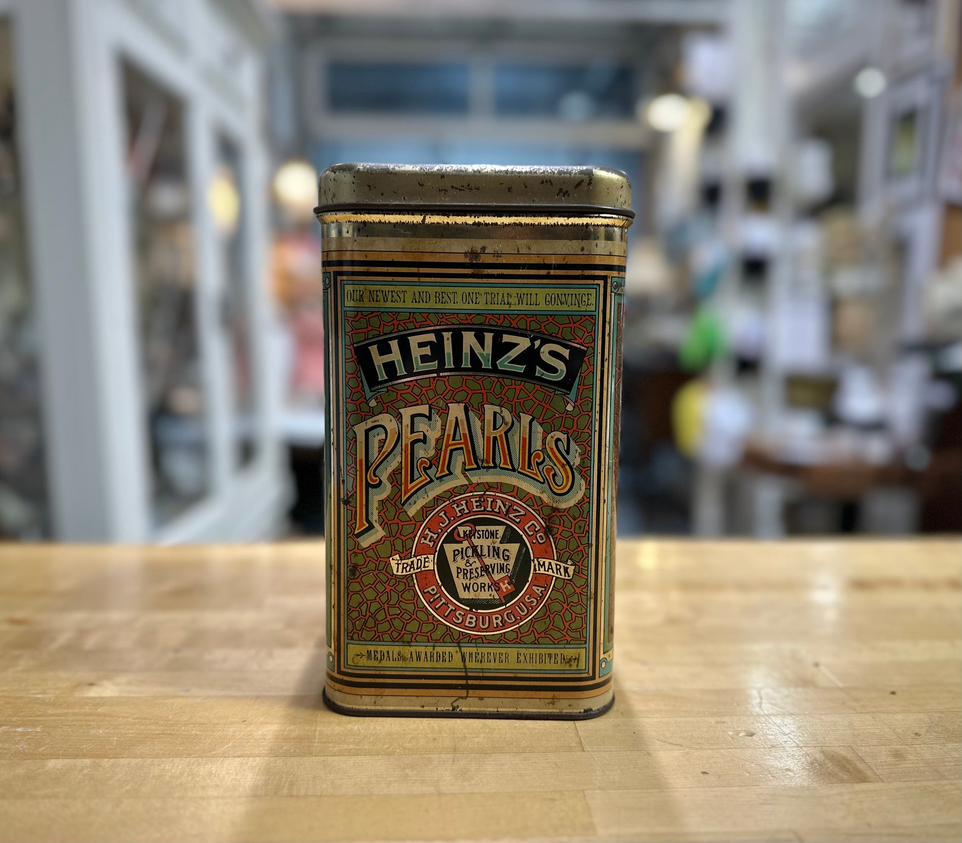 Side view of 1960’s vintage Heinz Pearls tin with classic branding