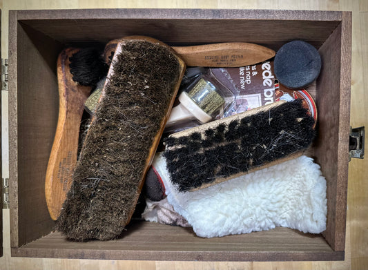Vintage Kiwi Shoe Grooming Kit open display with brushes and polish tins