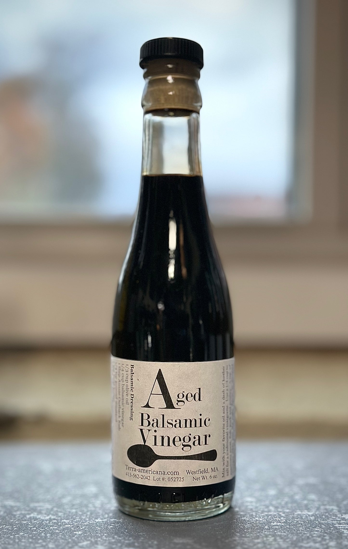 Aged balsamic vinegar in mini wine bottle - barrel-aged white balsamic from Terra Americana