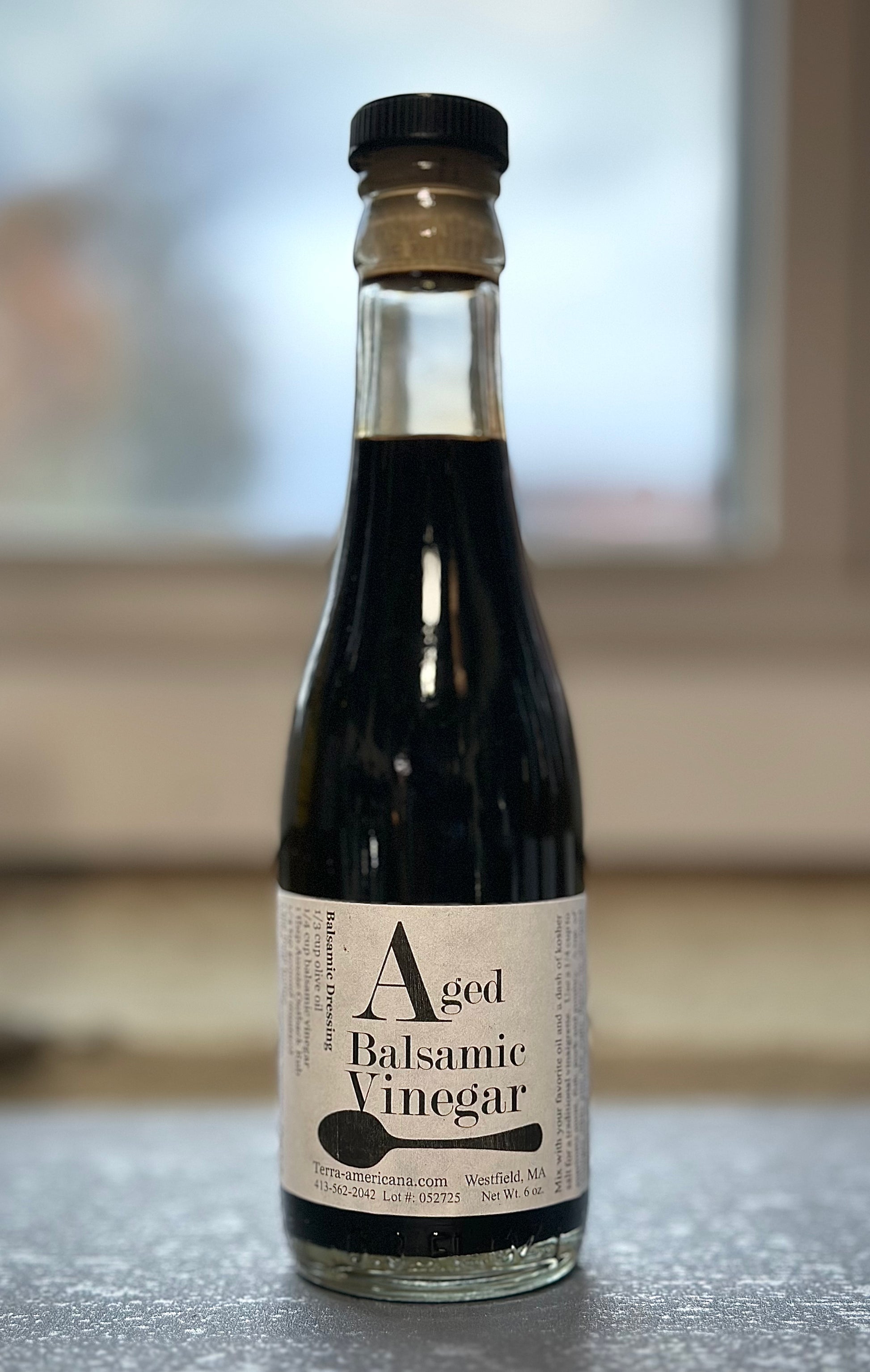 Aged balsamic vinegar in mini wine bottle - barrel-aged white balsamic from Terra Americana