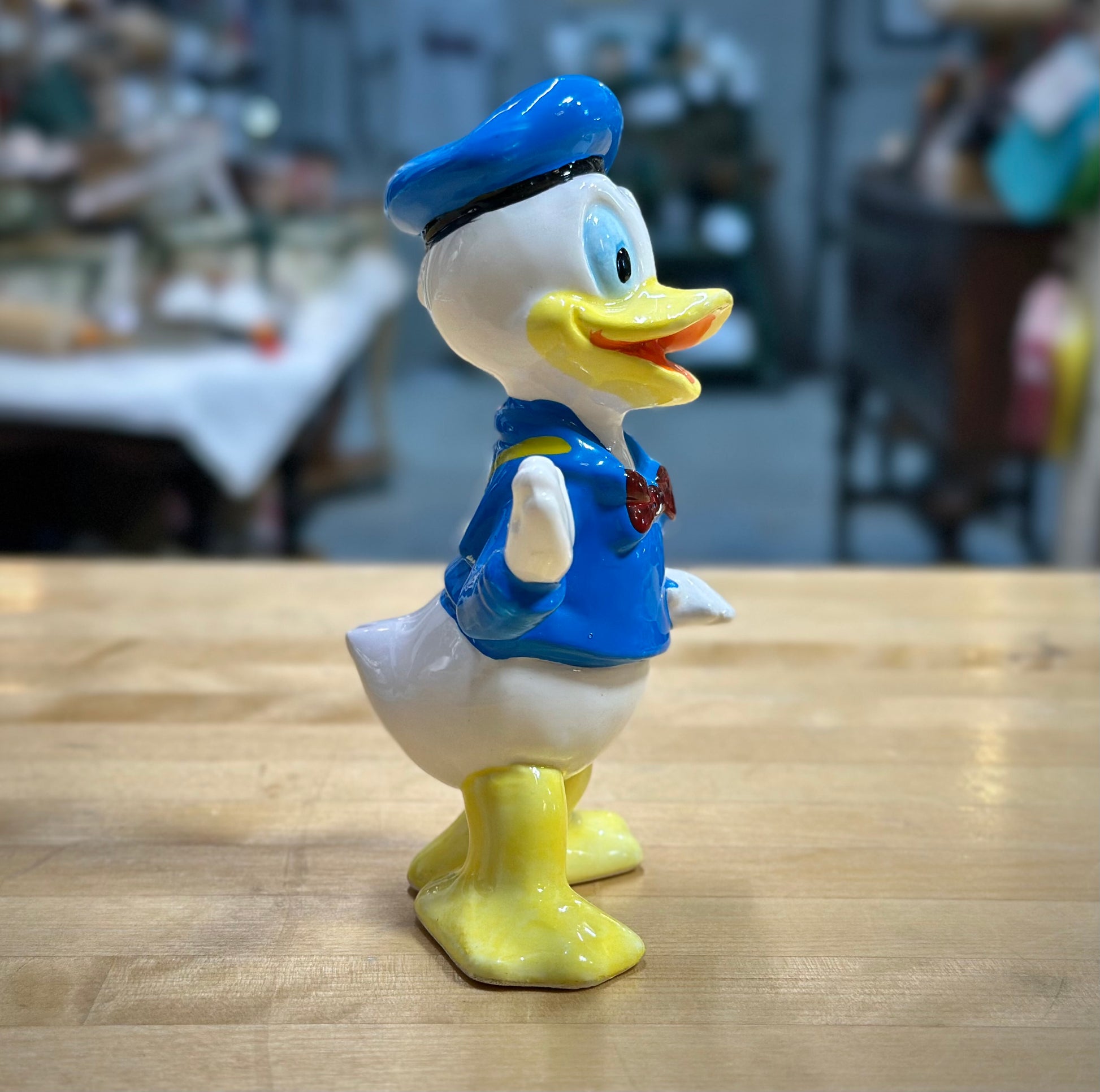 Side facing ceramic Donald Duck figurine