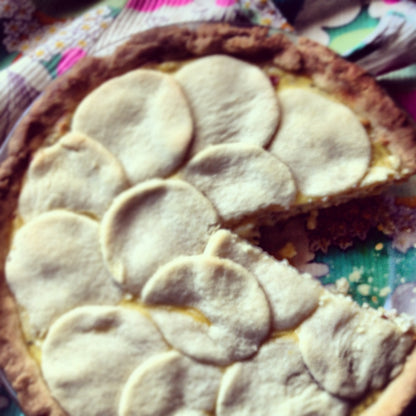 Close-up of Pizza Rustica Easter Pie showing cheesy filling