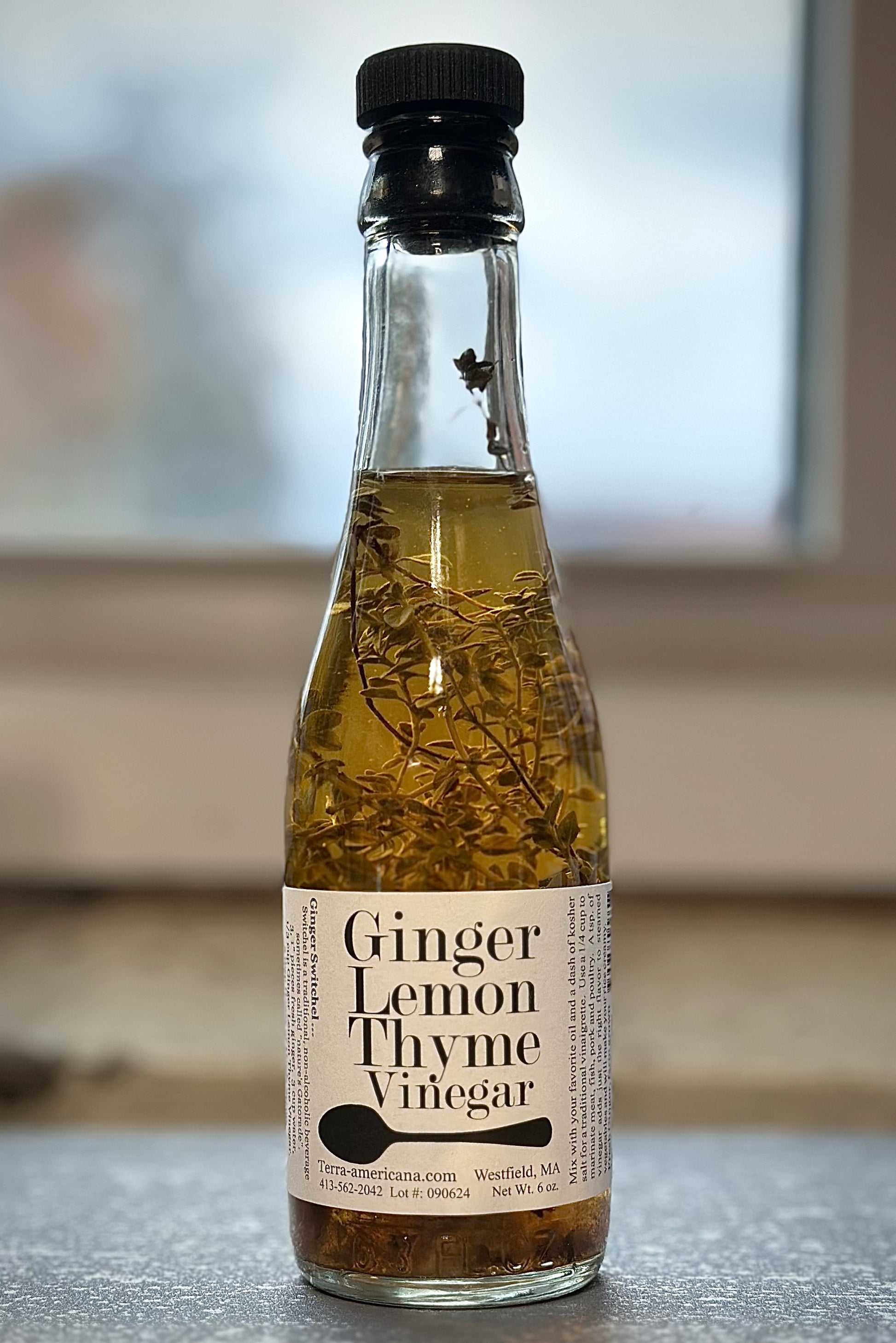 Artisan ginger lemon thyme vinegar with fresh ginger and lemon peel - gourmet herbal vinegar
