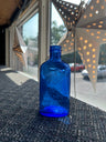 vintage cobalt blue milk of magnesia bottles