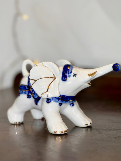 Collectible porcelain elephant detailed blue and gold design