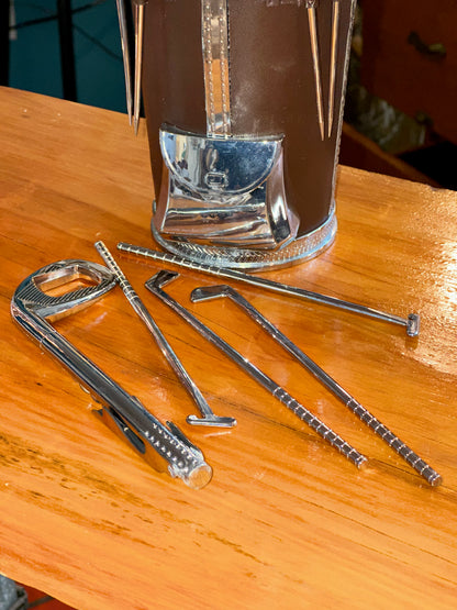 Detailed view of cocktail shaker tools vintage barware set