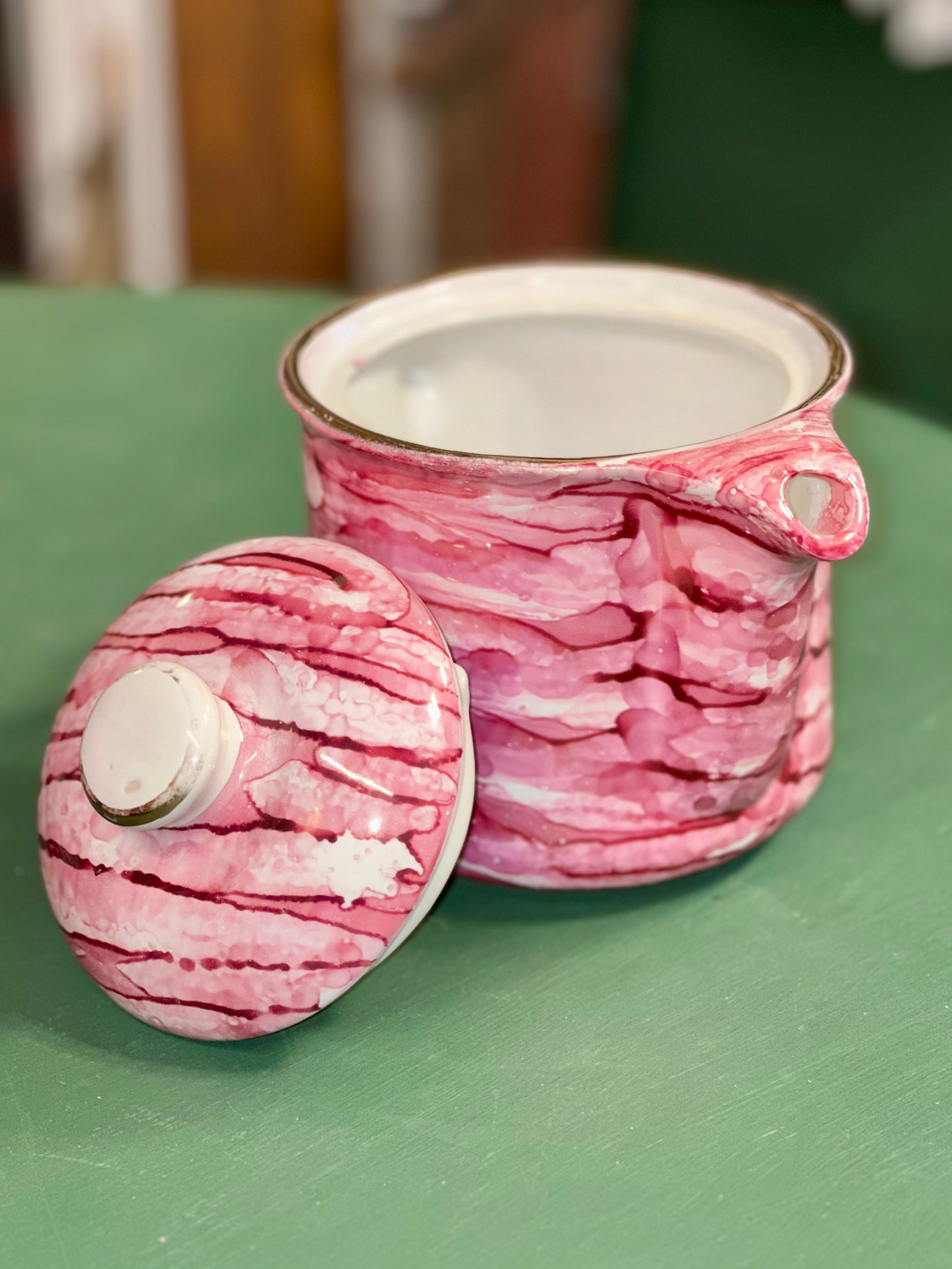Close up vintage Polish tea set pink and white marbled glaze teapot cups