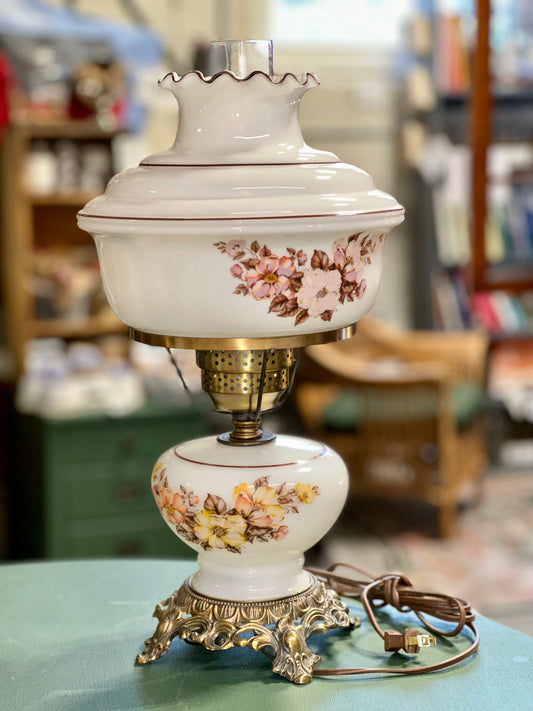 Vintage floral milk glass table lamp with hurricane shade and brass base
