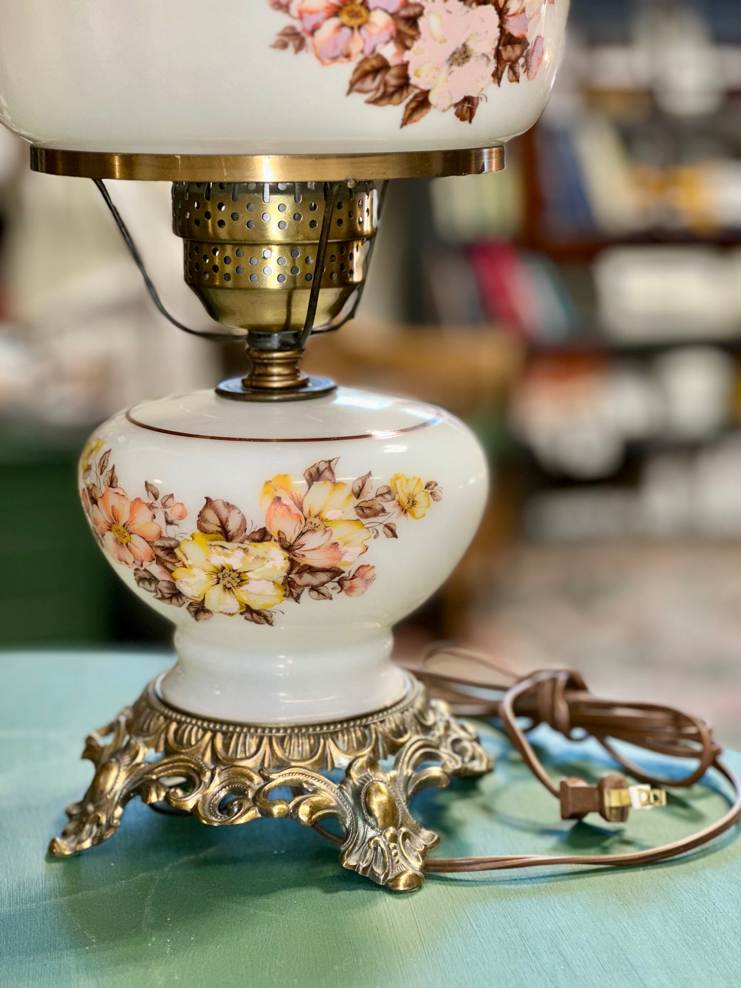 
Vintage cottagecore lamp glowing warm light milk glass floral design