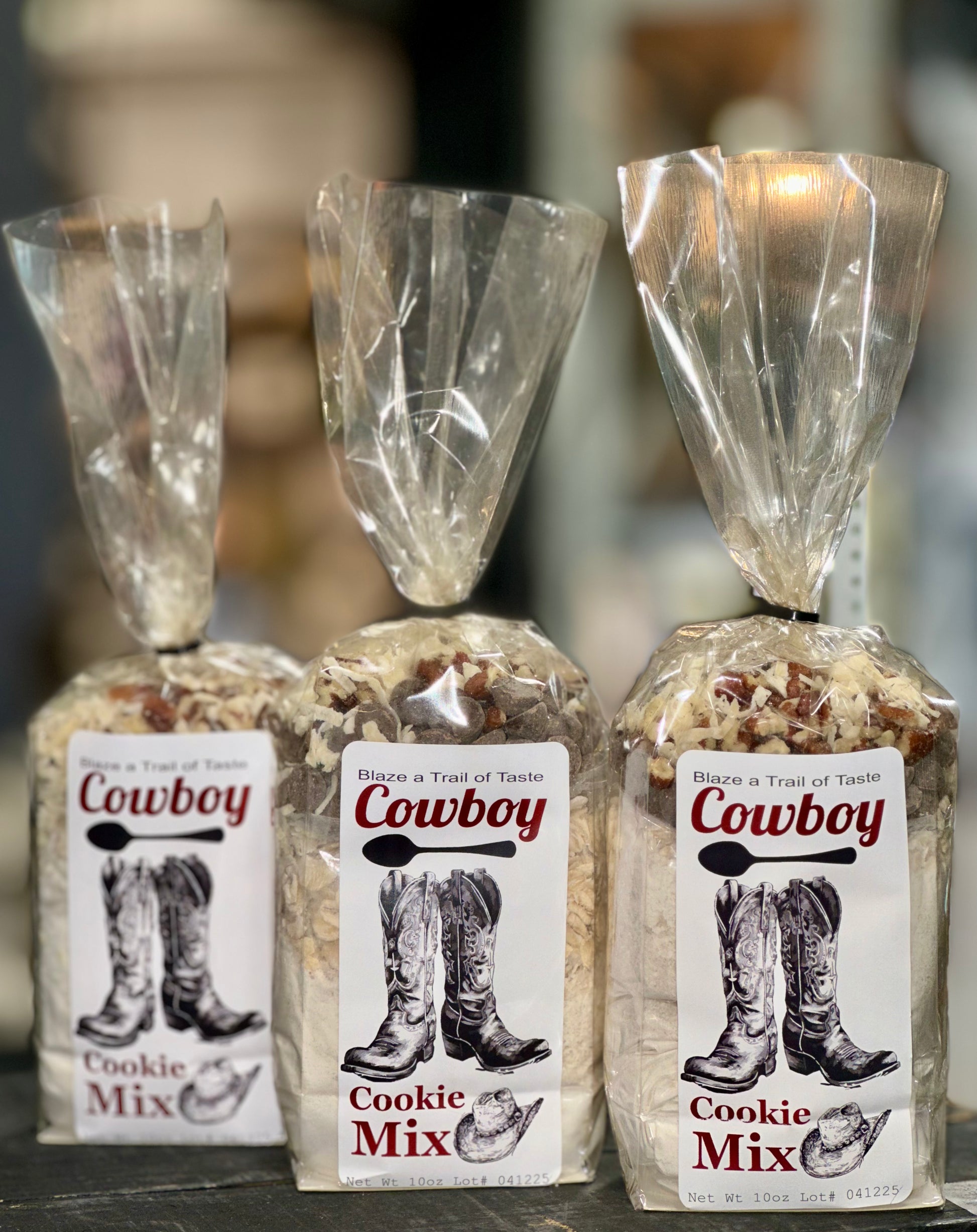 Three packages of Cowboy Cookie Mix 