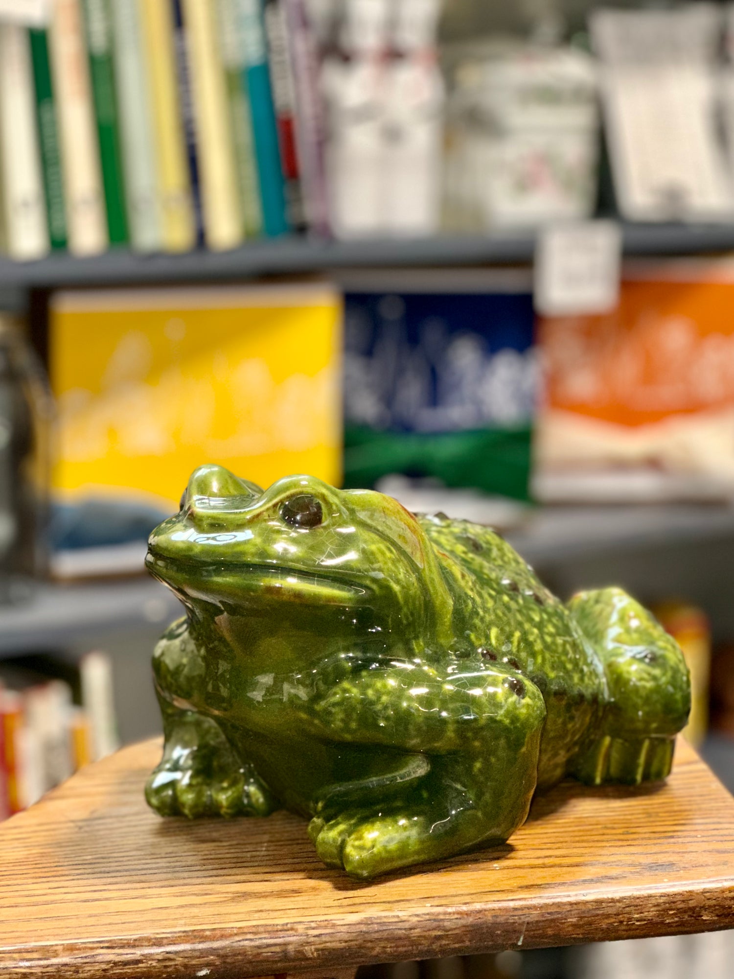 Vintage green ceramic frog sculpture with glossy majolica style glaze