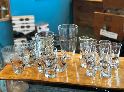Retro barware glasses set with black and gold carriage design