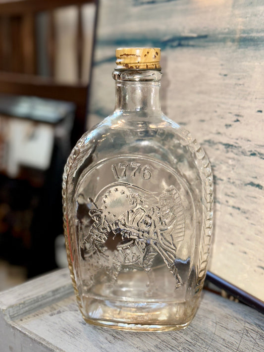Vintage 1776 Bicentennial glass decanter bottle with embossed Revolutionary War drummer design and original stopper