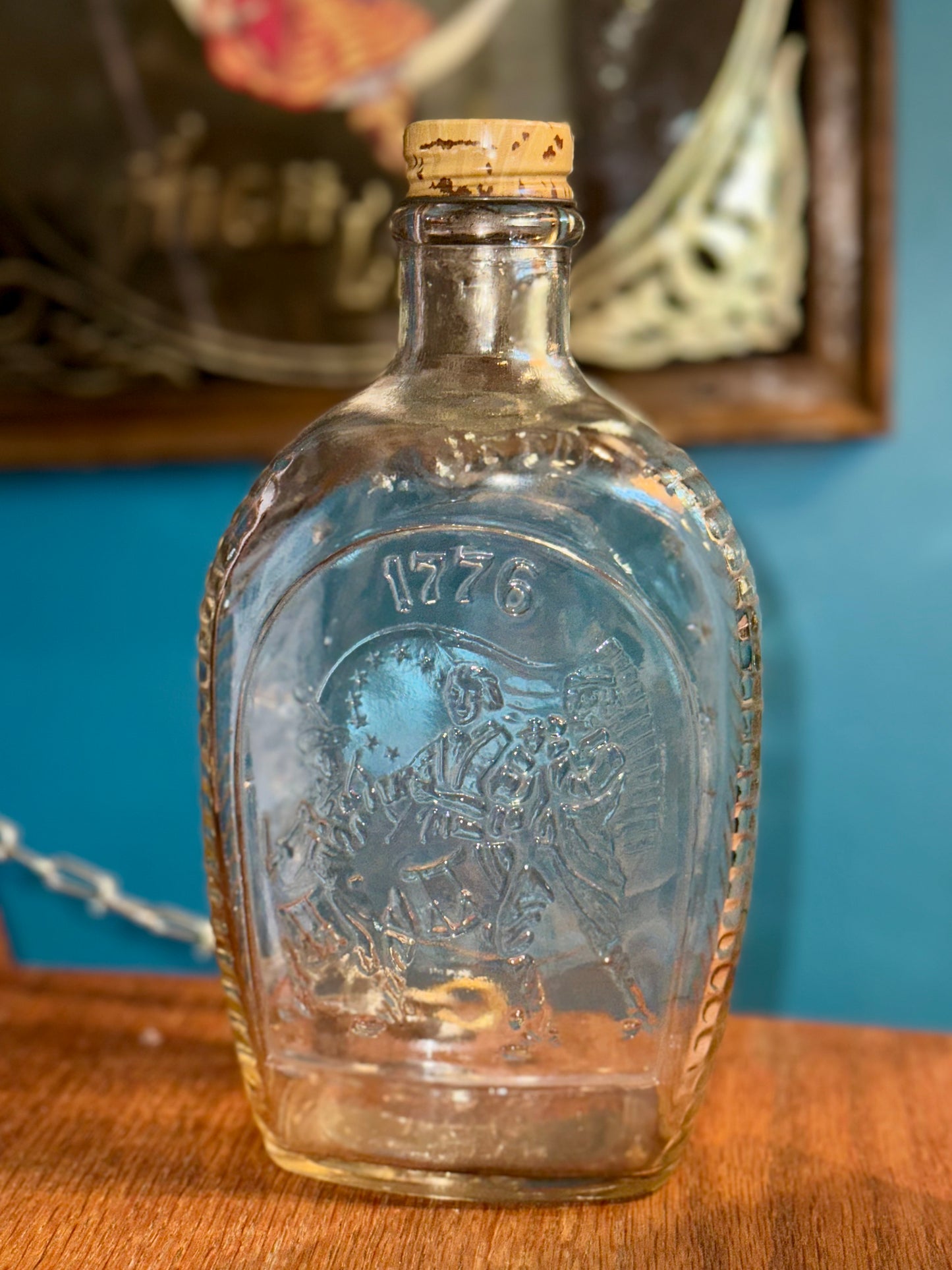 Clear glass patriotic Bicentennial decanter featuring colonial drummer and American flag motif