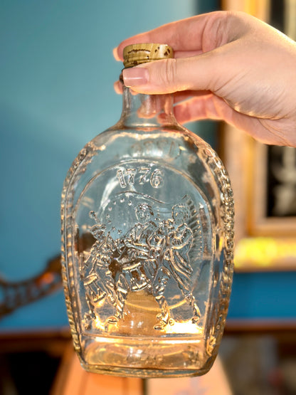 Americana 1776 commemorative glass liquor decanter bottle collectible with embossed patriotic scene