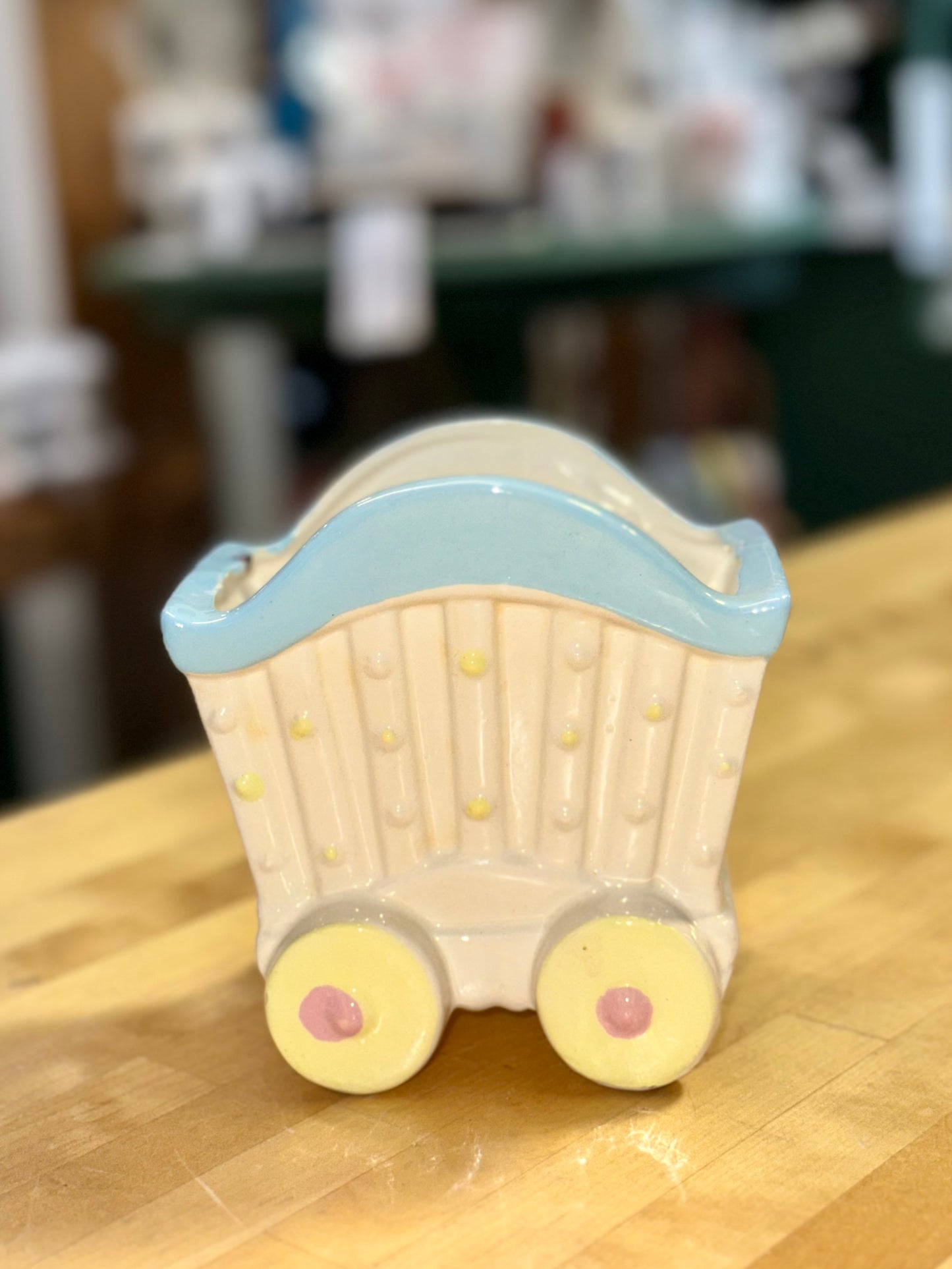 Ceramic baby carriage planter 
