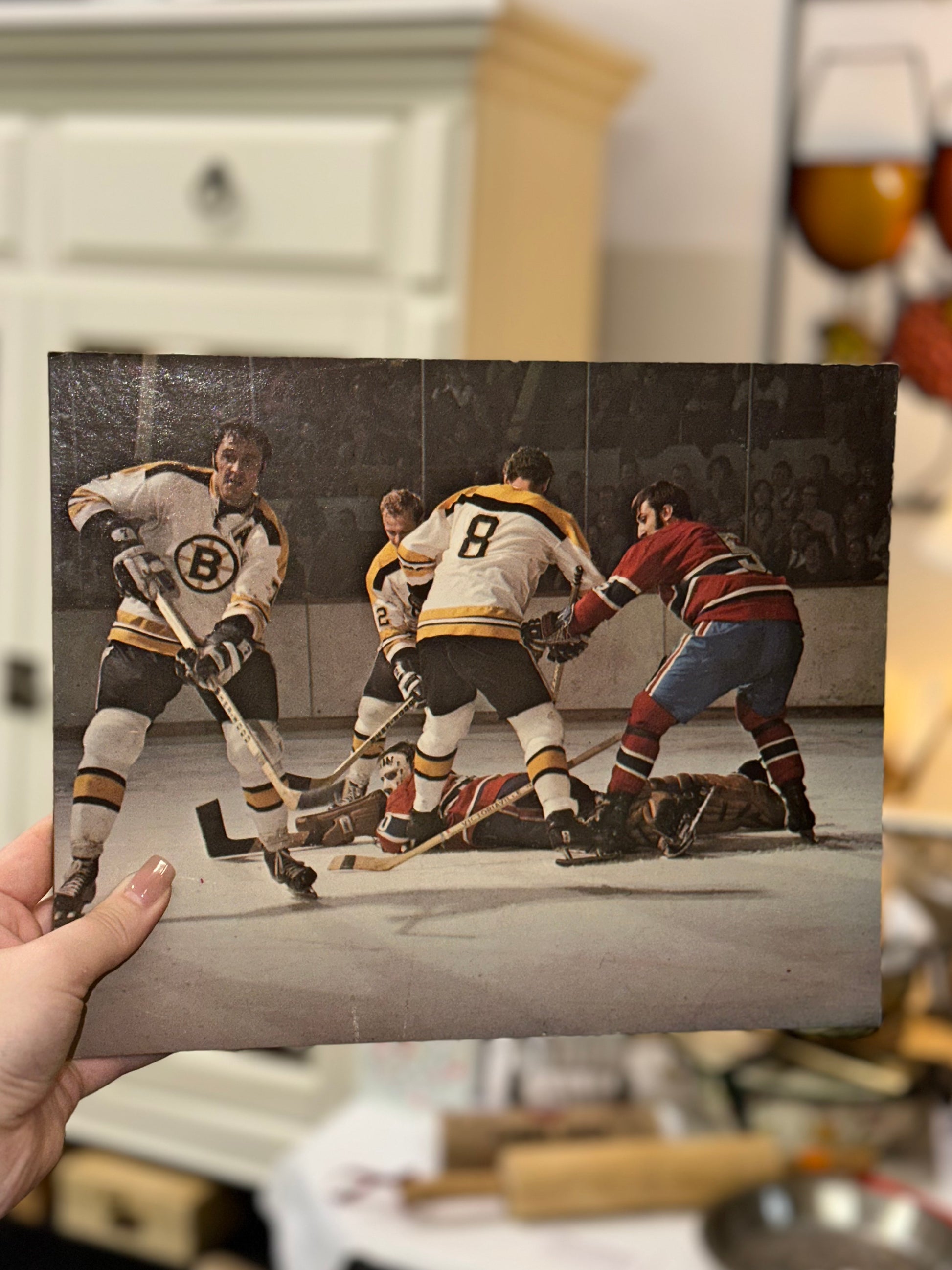 Boston Bruins goalie action print showcasing vintage professional hockey gameplay