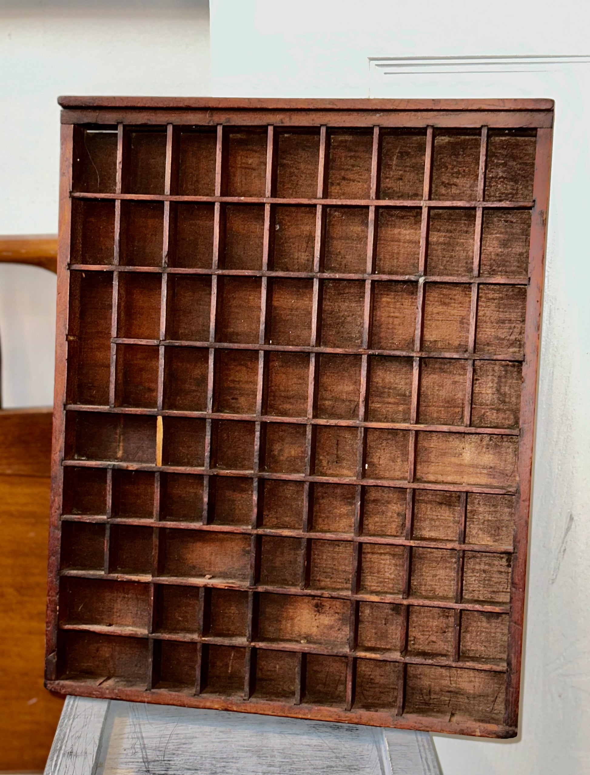 Rustic wooden display organizers and printer’s trays for showcasing collectibles, antiques, and small décor items