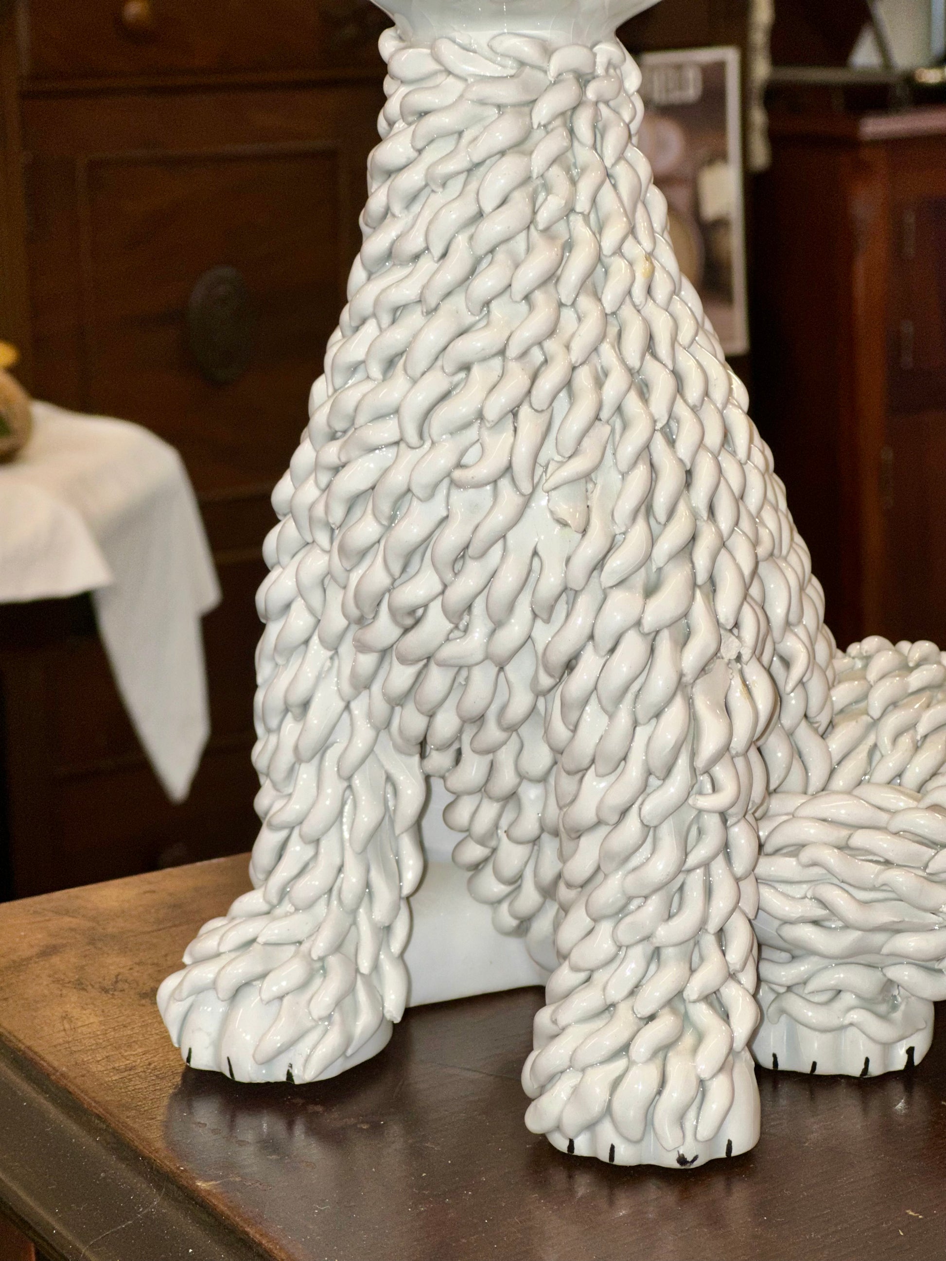 White spaghetti cat figurine from the Mid-Century era close-up