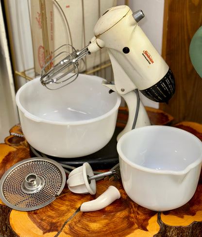 Classic Sunbeam Mixmaster stand mixer featuring milk glass bowl and beaters