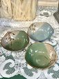 Set of three vintage Japanese stoneware bowls with green and blue glaze.