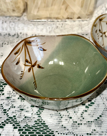 Freeform stoneware snack bowls featuring a wheat botanical design.