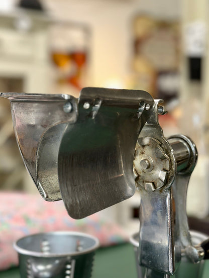 Vintage Saladmaster manual food processor close-up.
