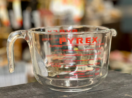 Pyrex 2-liter glass measuring cup with red measurement marking