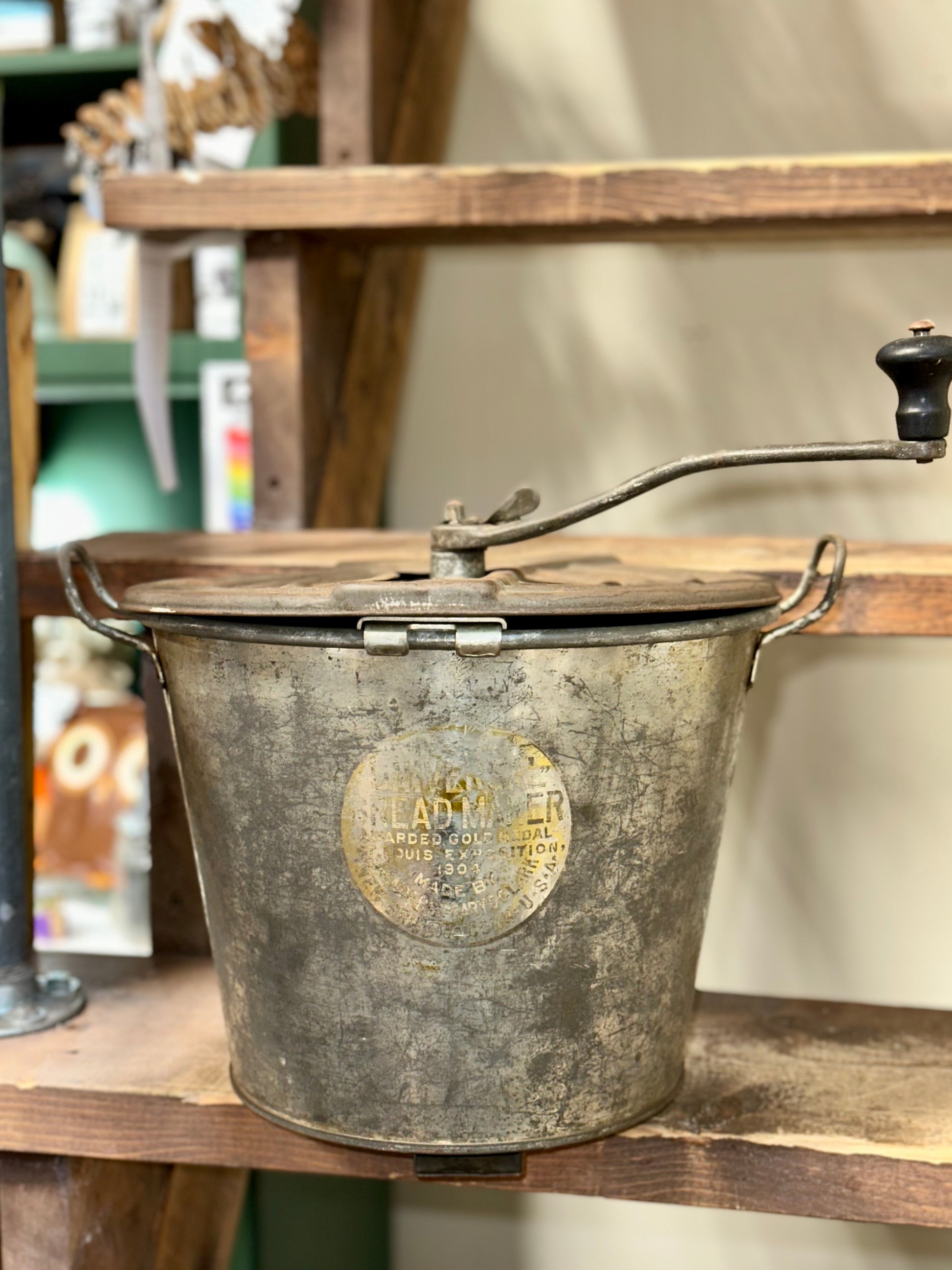 Antique Universal Bread Maker hand crank dough mixer with original metal lid and farmhouse patina