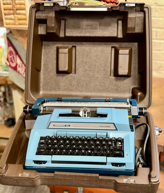 Vintage Smith-Corona Coronet XL electric typewriter in blue