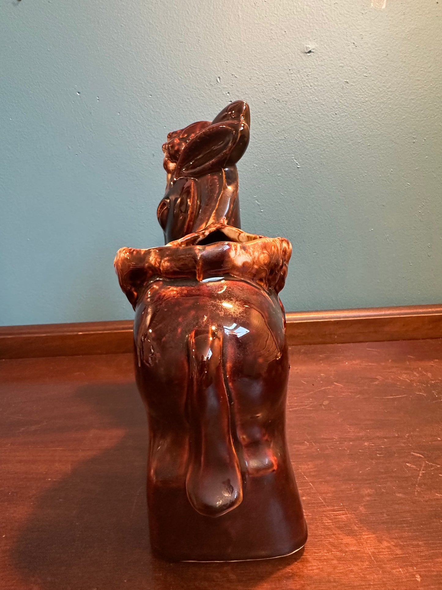 Rear view showing the glossy  brown  drip glazed ceramic finish