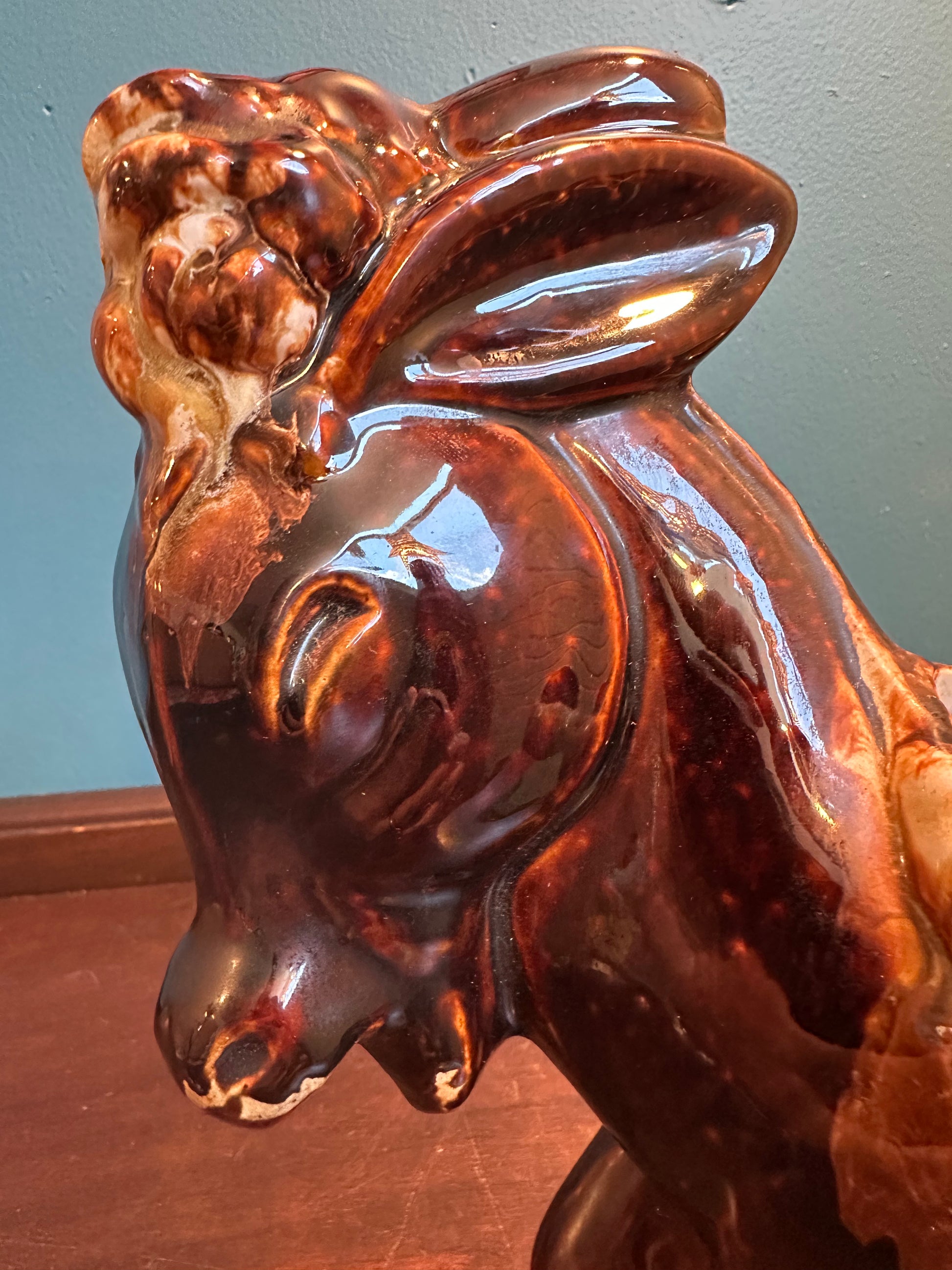Close-up of molded donkey face,  molded details and glossy vintage glaze